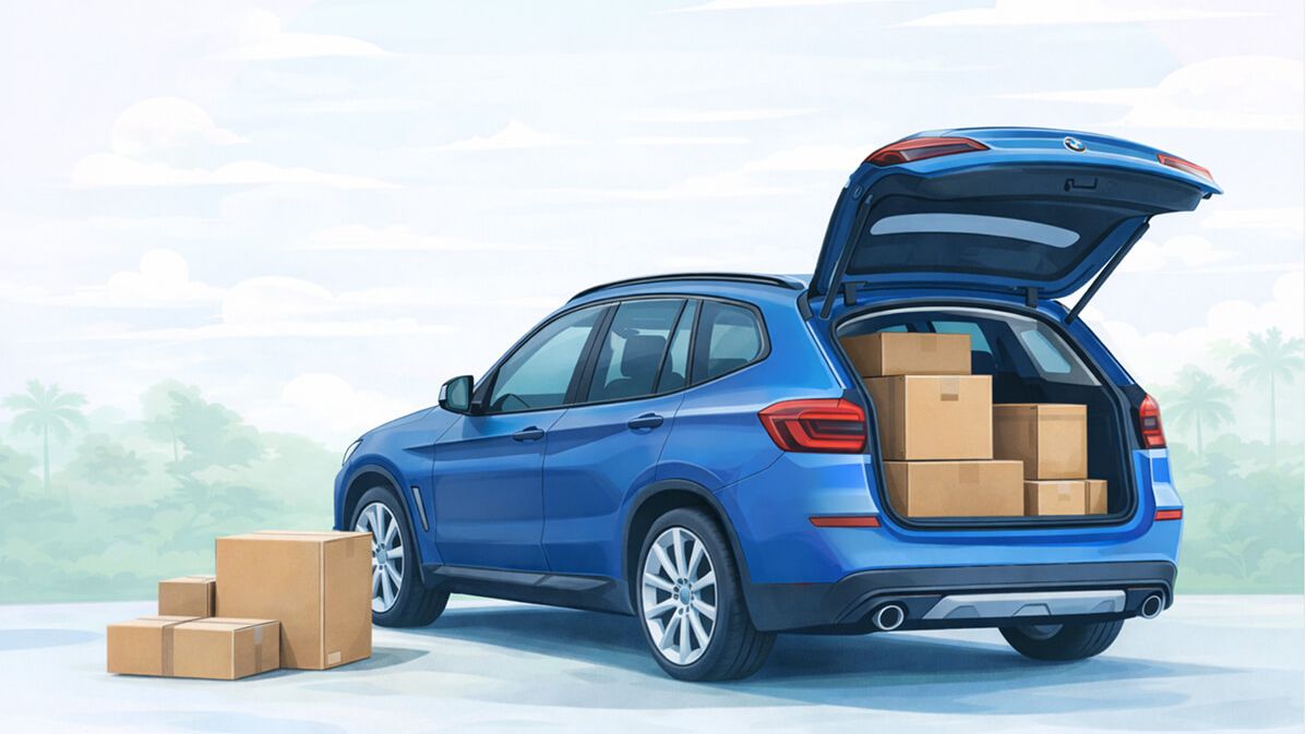 Open car trunk with IKEA-style flat-pack boxes ready for loading